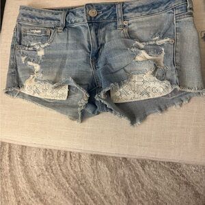 American Eagle Blue Jean Shorts with Distressed Lace Details